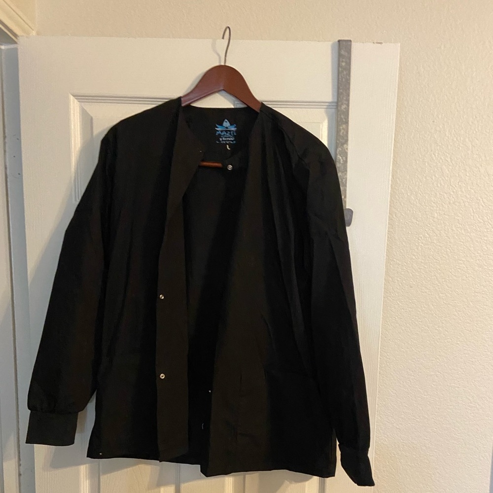 Black scrub jacket.